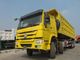 O caminhão basculante amarelo de 371hp 20M3 RHD Sinotruk Howo 6x4 para 40-50 toneladas carrega